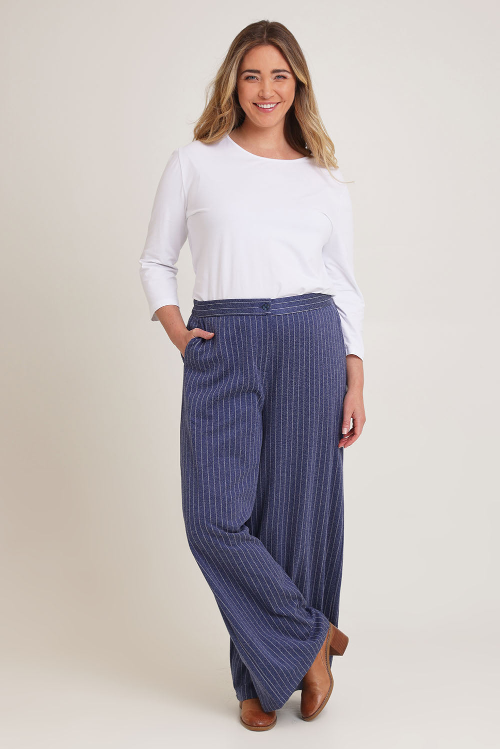 Model Chanel wearing size 16 of the Walk This Way Wide Leg Pants in colour Bluestripe (Blue), from the front, showing the whole outfit