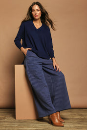 Model Madeline wearing size 10 of the Walk This Way Wide Leg Pants in colour Bluestripe (Blue), from the front, showing the whole outfit