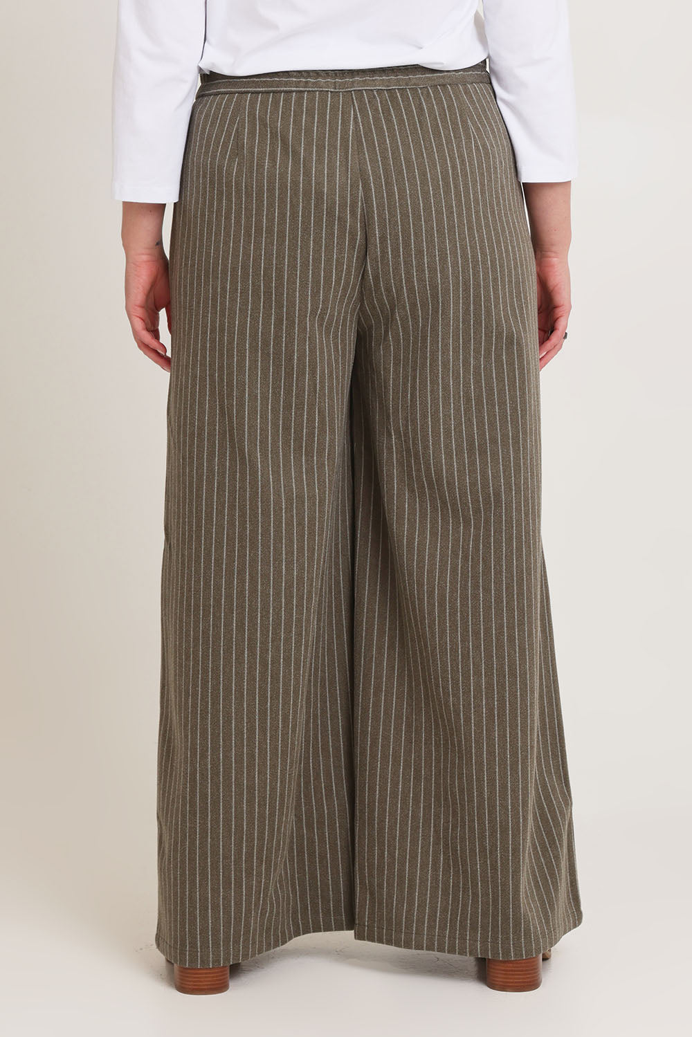 Model Chanel wearing size 16 of the Walk This Way Wide Leg Pants in colour Chocstripe, from the back