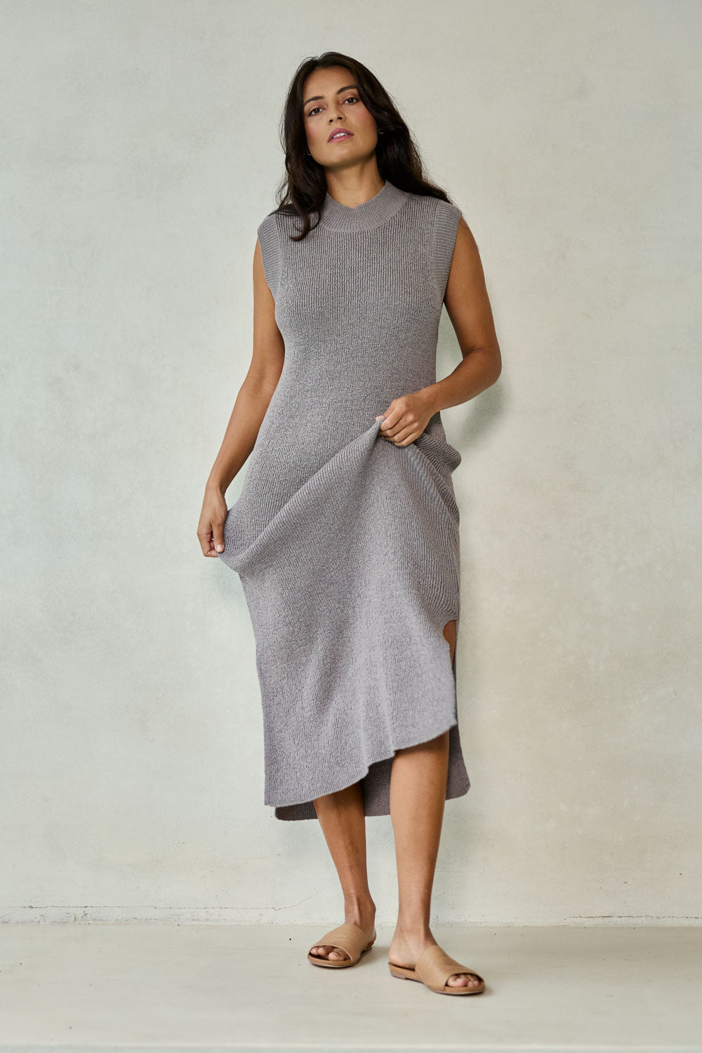 Model Tahnee wearing size S of the Cool Comfort Knit Maxi Dress in colour Earth, from the front, showing the whole outfit