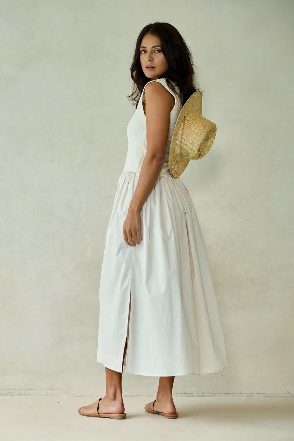 Model Tahnee wearing size 10 of the Sweet Intentions V Neck Maxi Dress in colour Cream, from the front, showing the whole outfit