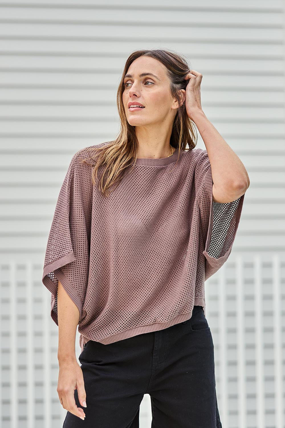 Model Tegand wearing size 10 of the Summer Ready Cotton Throw Sweater – Pecan in colour Pecan, in a cropped view