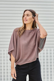 Model Tegand wearing size 10 of the Summer Ready Cotton Throw Sweater – Pecan in colour Pecan, in a cropped view