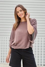 Model Tegand wearing size 10 of the Summer Ready Cotton Throw Sweater – Pecan in colour Pecan, in a cropped view