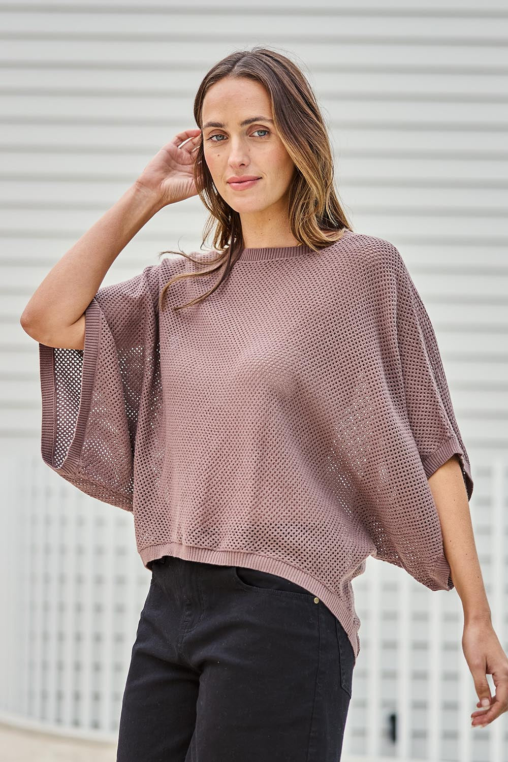 Model Tegand wearing size 10 of the Summer Ready Cotton Throw Sweater – Pecan in colour Pecan, in a cropped view