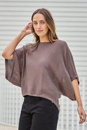 Model Tegand wearing size 10 of the Summer Ready Cotton Throw Sweater – Pecan in colour Pecan, in a cropped view