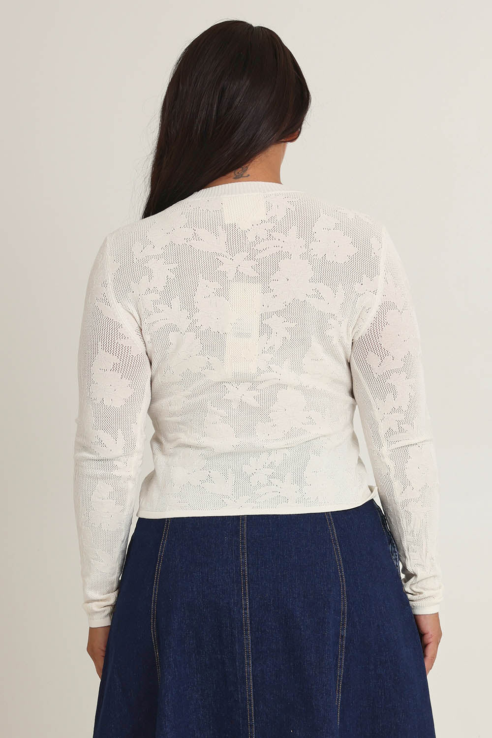 Model Ashleigh wearing size XL of the Love Layer Long Sleeve Knit Top in colour Milk, from the back