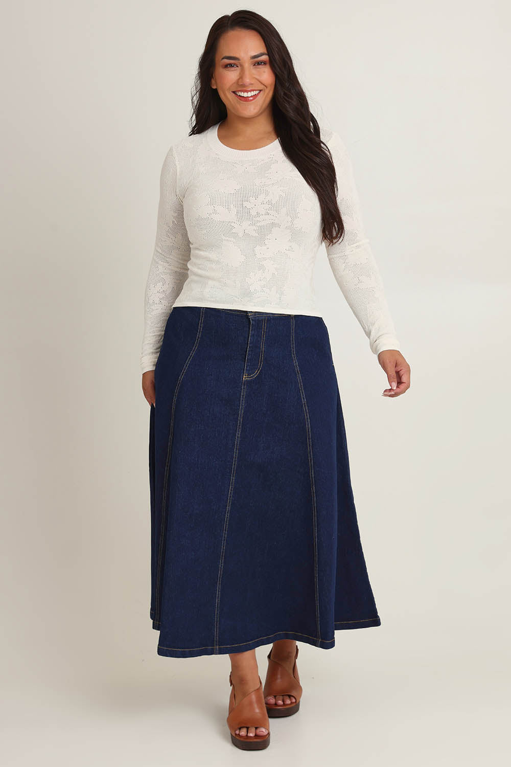 Model Ashleigh wearing size XL of the Love Layer Long Sleeve Knit Top in colour Milk, from the front, showing the whole outfit