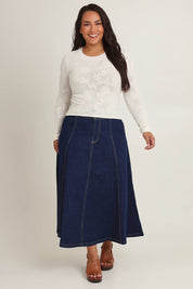 Model Ashleigh wearing size XL of the Love Layer Long Sleeve Knit Top in colour Milk, from the front, showing the whole outfit