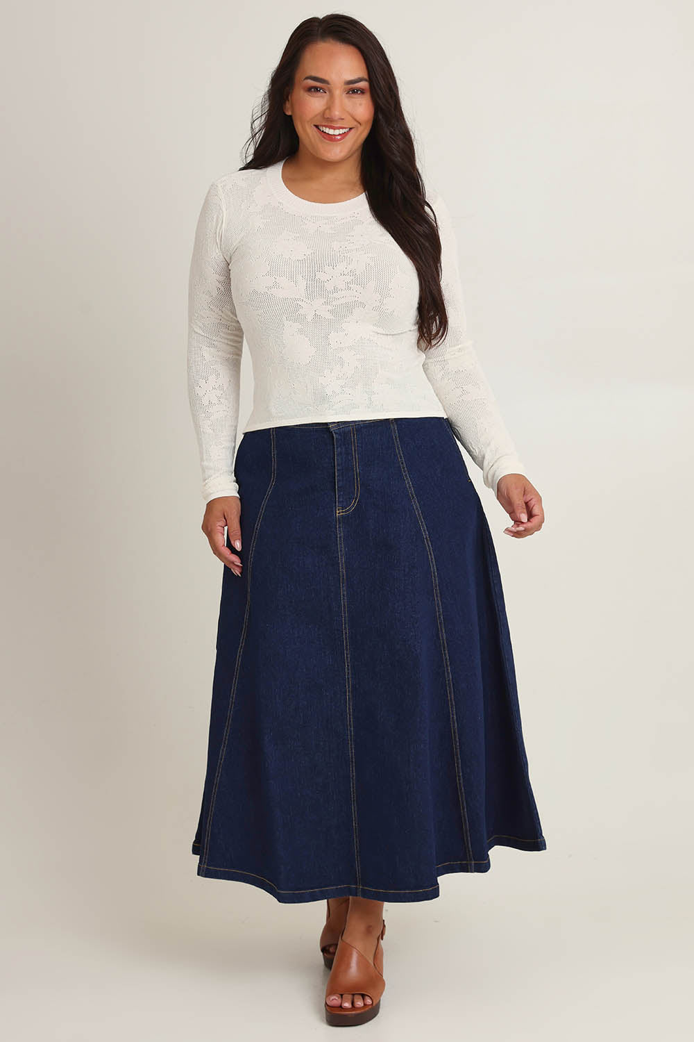 Model Ashleigh wearing size XL of the Love Layer Long Sleeve Knit Top in colour Milk, from the front, showing the whole outfit