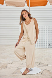 Model Tegand wearing size 10 of the Summer Daze Pull On Linen Blend Knit Pant – Sand in colour Sand, from the front