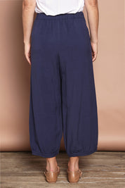 Model Katie wearing size 10 of the Summer Daze Linen Blend Pull On 3/4 Pant in colour Navy (Blue), from the back