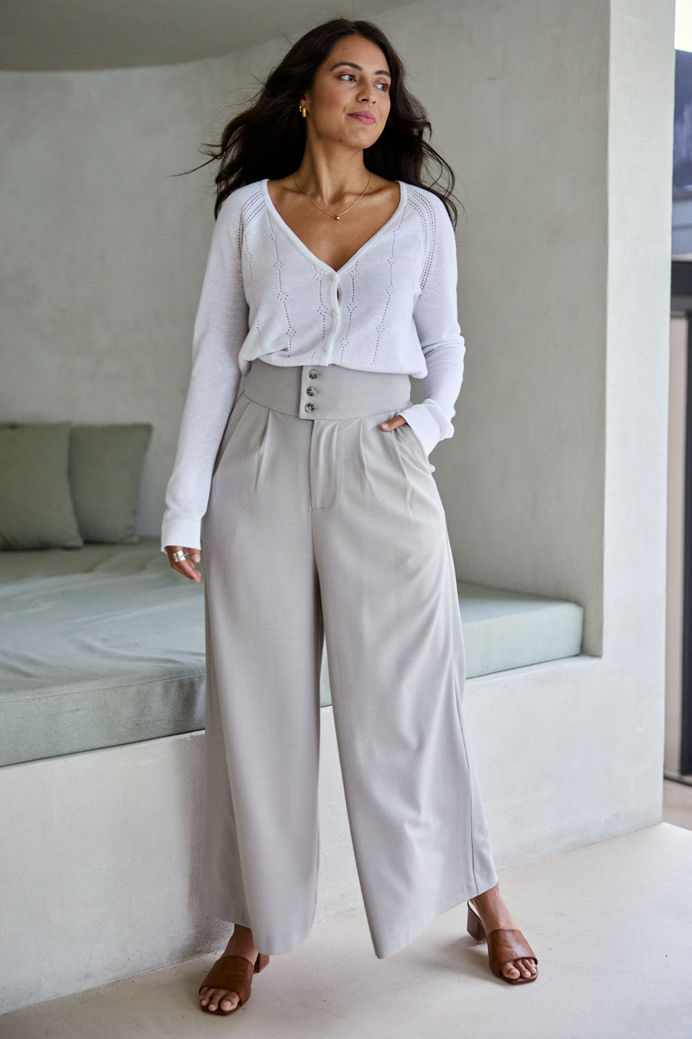 Model Tahnee wearing size 10 of the All The Feels High Waisted Wide Leg Pants in colour Rock, from the front, showing the whole outfit