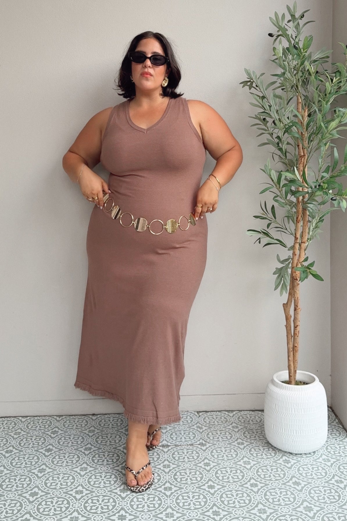 Model Maddy wearing size XXL of the Feeling Mighty Fine Fringe Hem Knit Maxi Dress in colour Rosewood, from the front, showing the whole outfit
