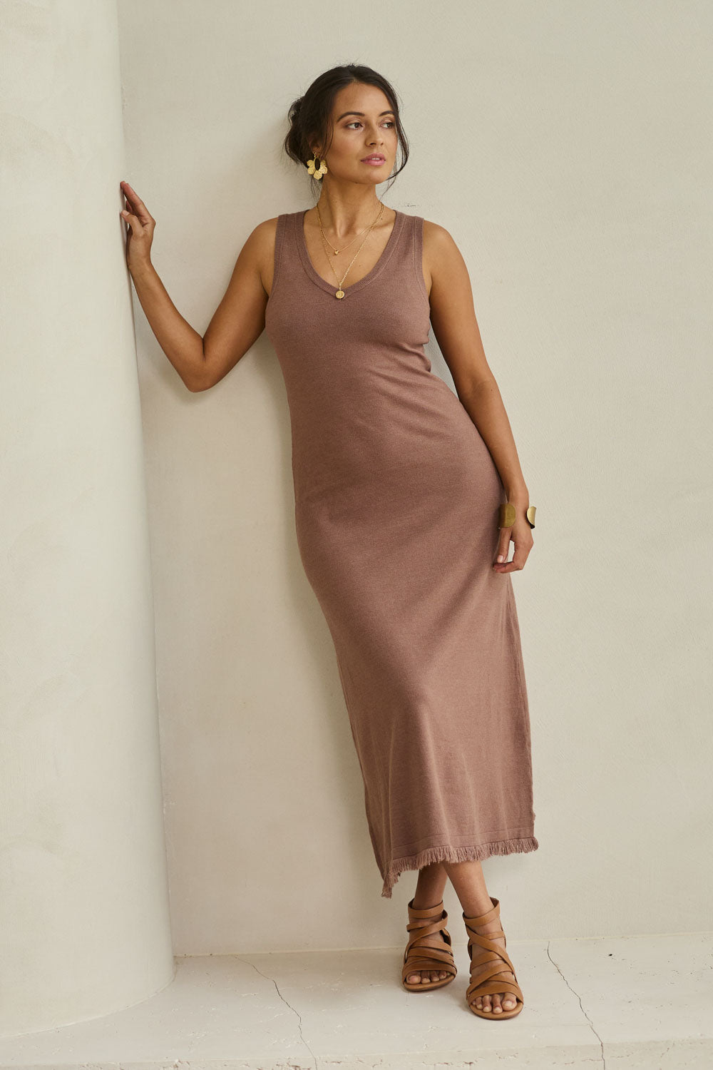 Model Tahnee wearing size S of the Feeling Mighty Fine Fringe Hem Knit Maxi Dress in colour Rosewood, from the front, showing the whole outfit