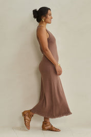 Model Tahnee wearing size S of the Feeling Mighty Fine Fringe Hem Knit Maxi Dress in colour Rosewood, from the front, showing the whole outfit