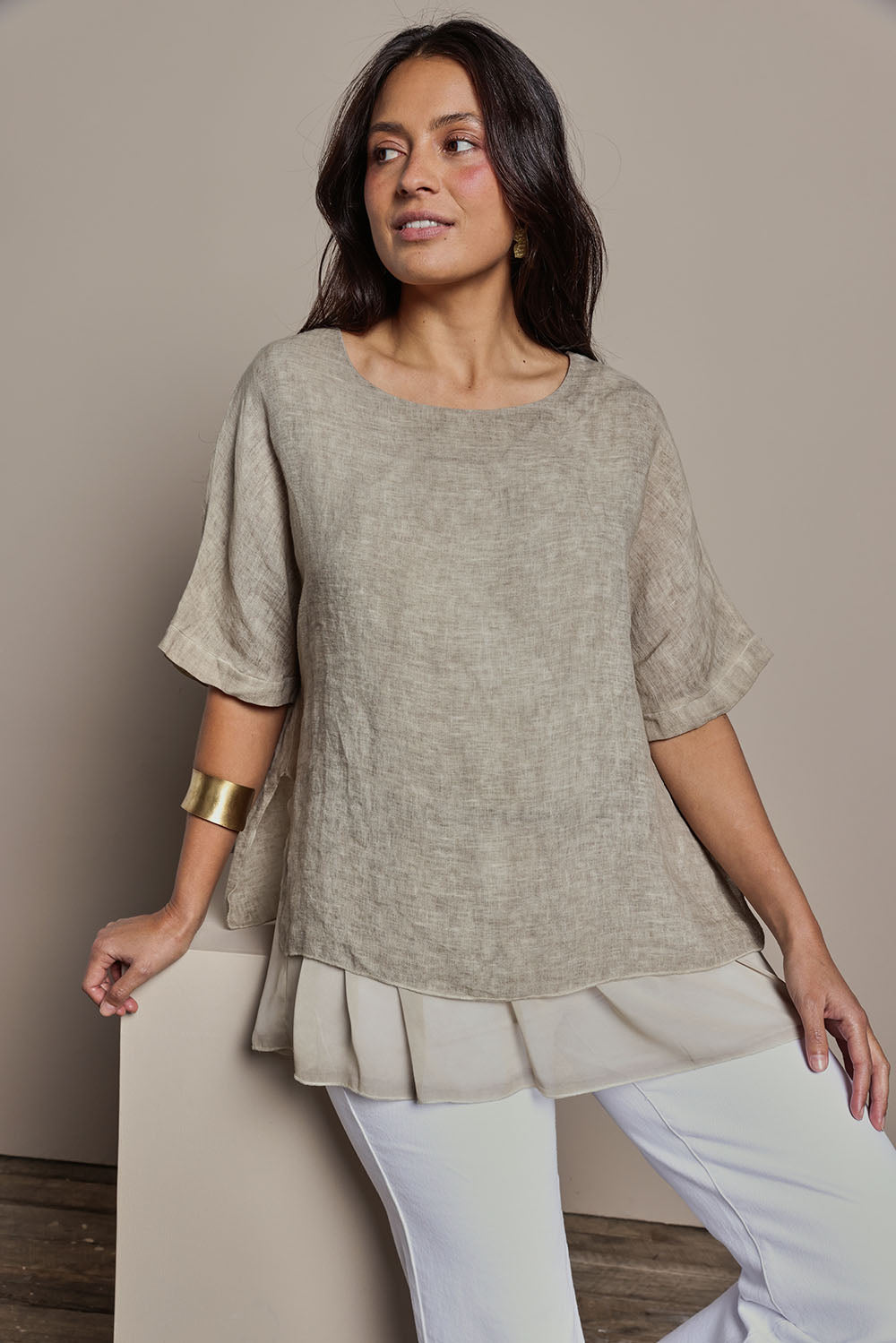 Model Tahnee wearing size 10 of the Layers Of Love Linen Overlay Top in colour Mocha, from the front, cropped image