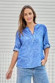Model Tegand wearing size 10 of the Cool Ease Embroidered Cotton Shirt – Cornflower in colour Cornflower, in a cropped view