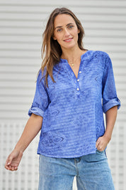Model Tegand wearing size 10 of the Cool Ease Embroidered Cotton Shirt – Cornflower in colour Cornflower, in a cropped view