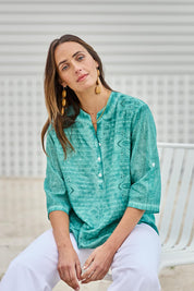 Model Tegand wearing size 10 of the Cool Ease Embroidered Cotton Shirt – Lagoon in colour Lagoon, from an angle