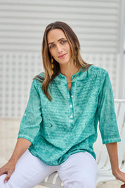 Model Tegand wearing size 10 of the Cool Ease Embroidered Cotton Shirt – Lagoon in colour Lagoon, in a cropped view