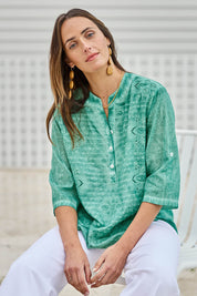 Model Tegand wearing size 10 of the Cool Ease Embroidered Cotton Shirt – Lagoon in colour Lagoon, in a cropped view