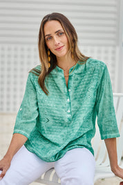 Model Tegand wearing size 10 of the Cool Ease Embroidered Cotton Shirt – Lagoon in colour Lagoon, in a cropped view