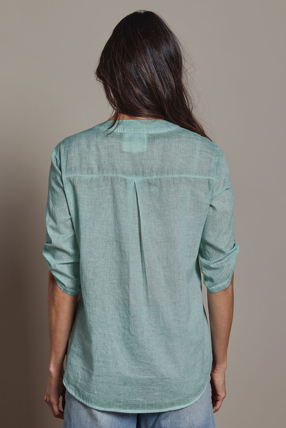 Model Amanda wearing size 10 of the Cool Ease Embroidered Cotton Shirt in colour Mint (Green), from the back