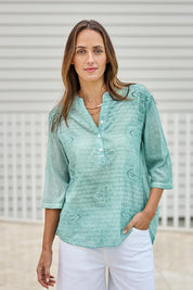 Model Tegand wearing size 10 of the Cool Ease Embroidered Cotton Shirt – Mint in colour Mint, in a cropped view