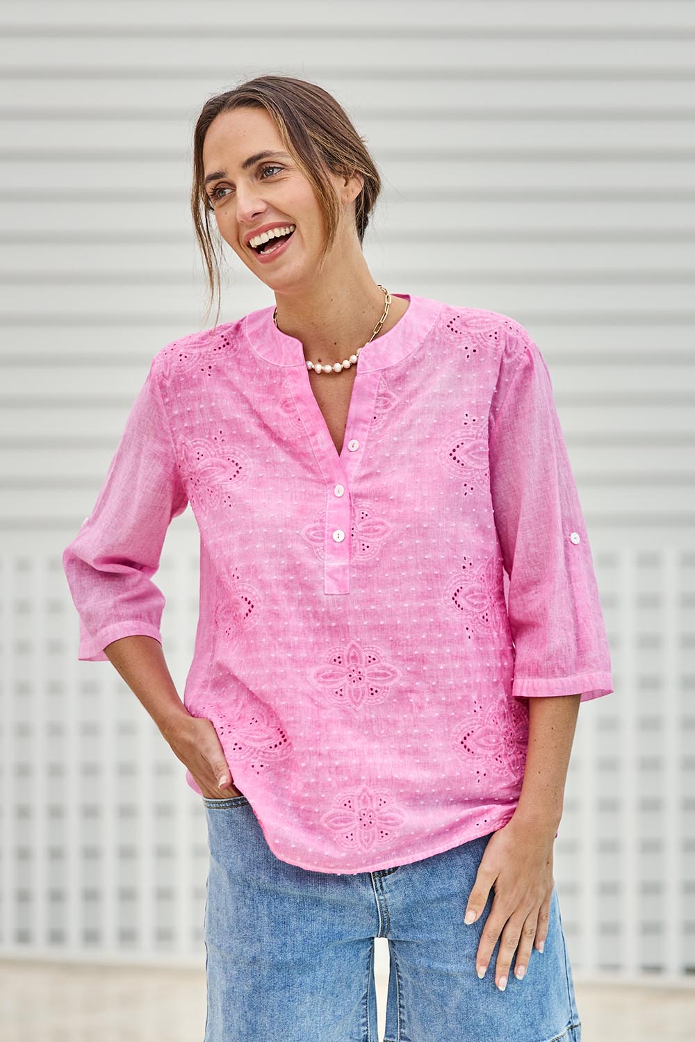 Model Tegand wearing size 10 of the Cool Ease Embroidered Cotton Shirt – Pink in colour Pink, in a cropped view