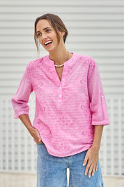 Model Tegand wearing size 10 of the Cool Ease Embroidered Cotton Shirt – Pink in colour Pink, in a cropped view