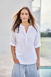 Model Tegand wearing size 10 of the Cool Ease Embroidered Cotton Shirt – White in colour White, in a cropped view