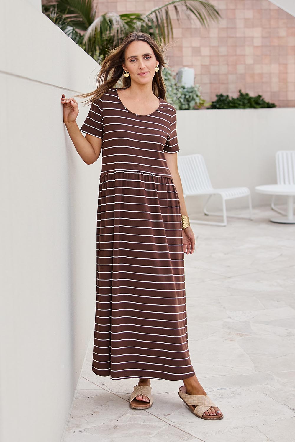 Model Tegand wearing size 10 of the Casual Saturday Dress – Chocstripe in colour Chocstripe, from the front