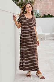 Model Tegand wearing size 10 of the Casual Saturday Cotton Dress – Chocstripe in colour Chocstripe, from the front