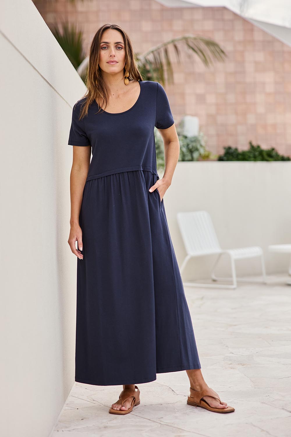 Model Tegand wearing size 10 of the Casual Saturday Dress – Navy in colour Navy, from the front