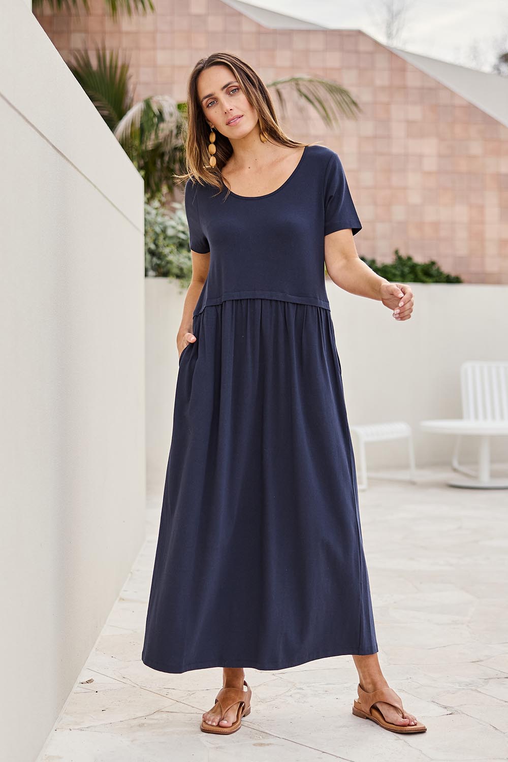 Model Tegand wearing size 10 of the Casual Saturday Dress – Navy in colour Navy, from the front