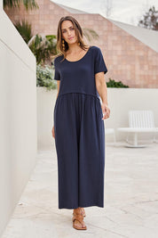 Model Tegand wearing size 10 of the Casual Saturday Dress – Navy in colour Navy, from the front