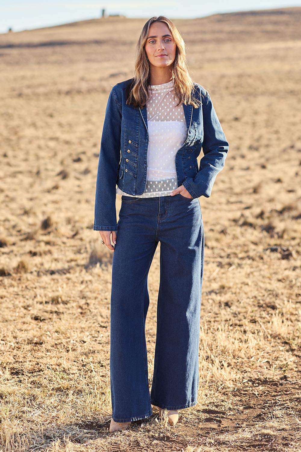 Model Tegan wearing size 10 of the You Have My Attention Denim Jacket in colour Denim (Blue), from the front, showing the whole outfit