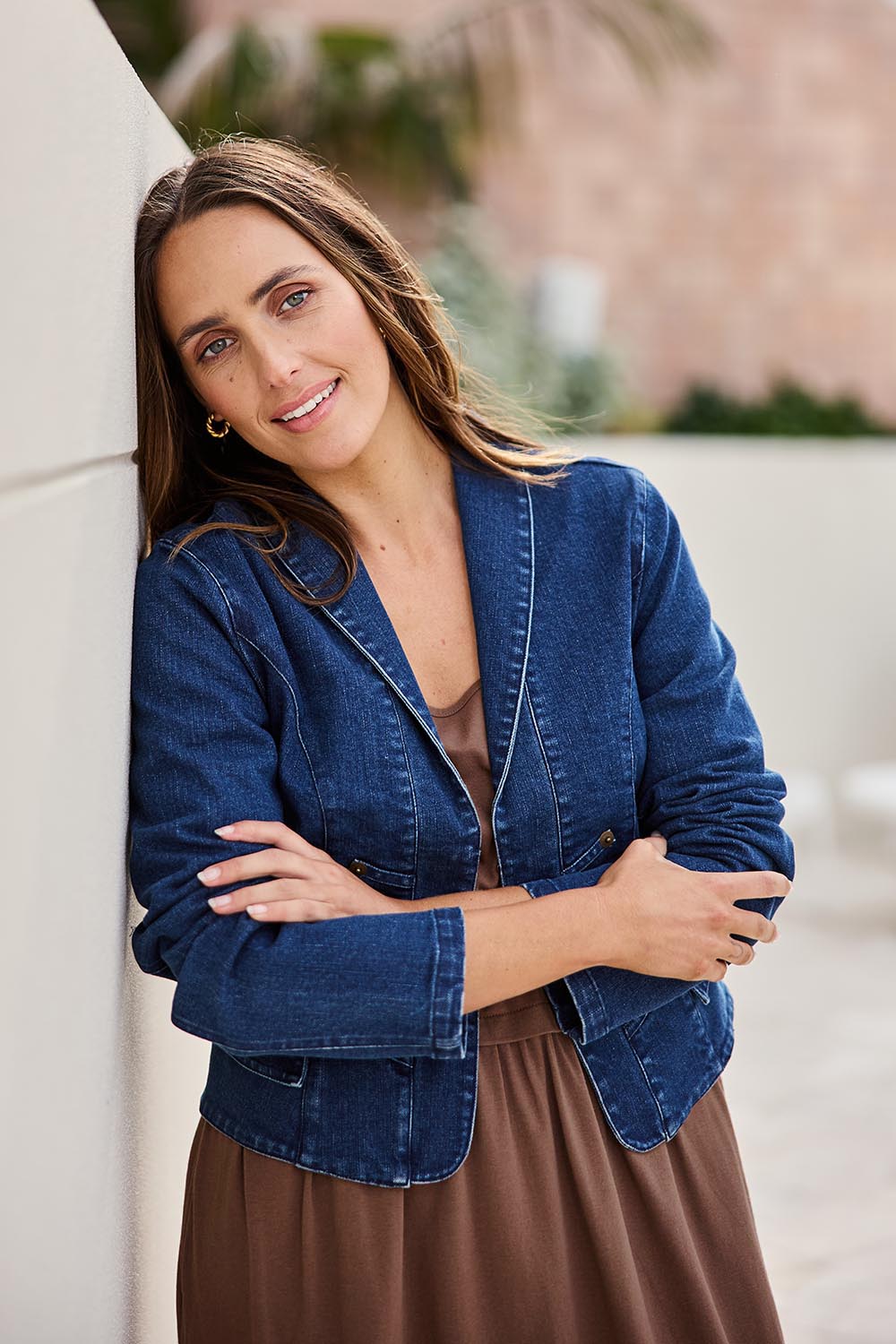 Model Tegand wearing size 10 of the You Have My Attention Denim Jacket - Denim in colour Denim, from an angle
