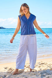 Model Tegan wearing size 10 of the Beach Wandering Cotton Pants in colour Bluestripe (Blue), from the front, showing the whole outfit