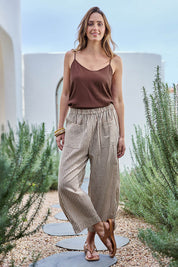 Model Tegand wearing size 10 of the Beach Wandering Cotton Pants – Chocstripe in colour Chocstripe, from the front