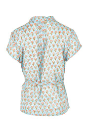 Product shot of the Morning Sunshine Cotton Blouse in colour Bluefleur (Blue), from the back