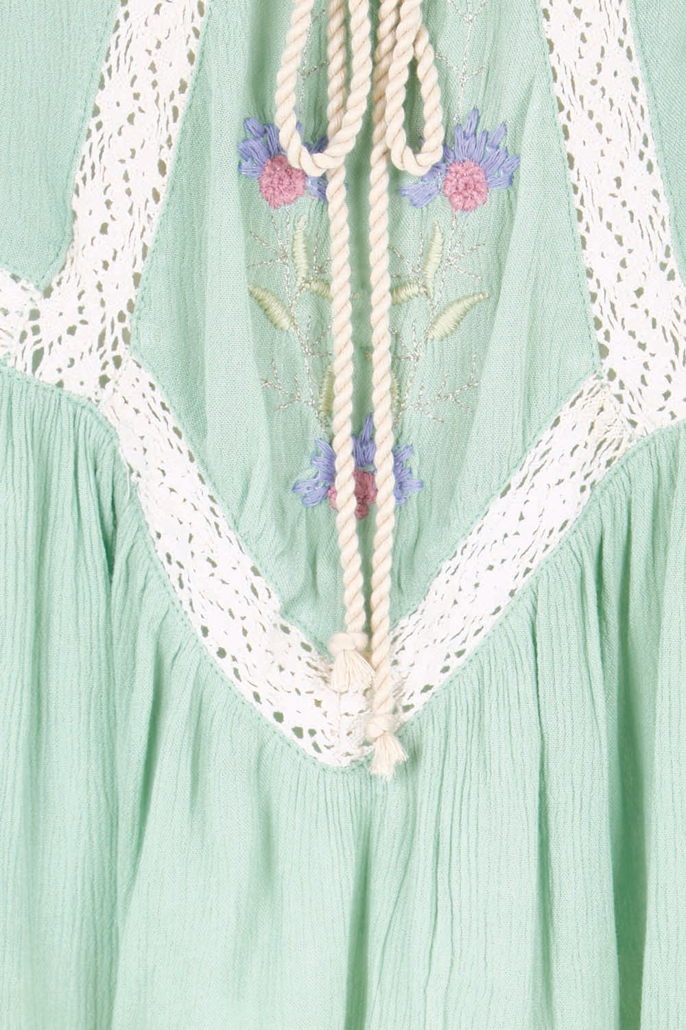 Product shot of the Morning Sunlight Embroidered Blouse – Pistachio in colour Pistachio, showing detail