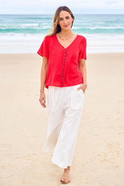 Model Tegan wearing size 10 of the Pocket Full Of Sunshine Cotton Blend  3/4 Pants in colour White (White), from the front, showing the whole outfit