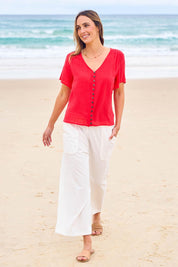 Model Tegan wearing size 10 of the Pocket Full Of Sunshine Cotton Blend  3/4 Pants in colour White (White), from the front, showing the whole outfit