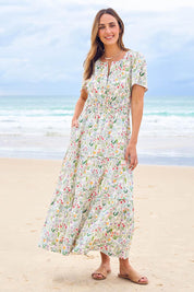 Model Tegan wearing size 10 of the Sweet Feels Cotton Maxi Dress in colour Garden, from the front, showing the whole outfit