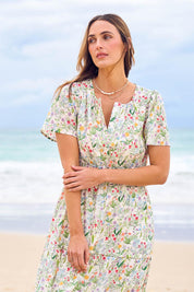 Model Tegan wearing size 10 of the Sweet Feels Cotton Maxi Dress in colour Garden, from the front, showing the whole outfit