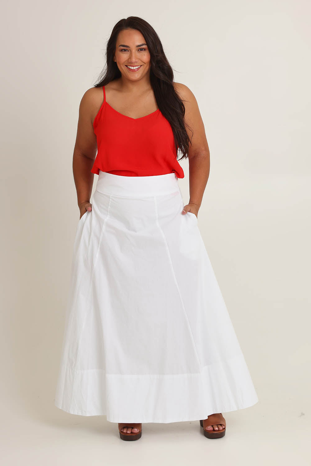 Model Ashleigh wearing size 16 of the Timeless Love Cotton Maxi Skirt in colour White (White), from the front, showing the whole outfit