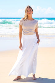 Model Tegan wearing size 10 of the Timeless Love Cotton Maxi Skirt in colour White (White), from the front, showing the whole outfit