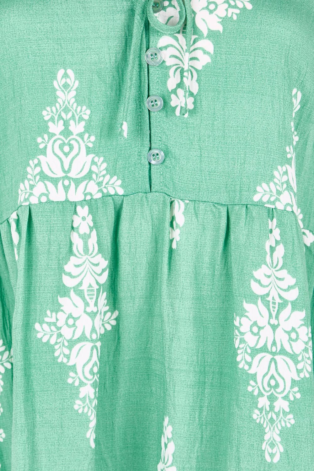 Product shot of the Sunset Happy Hour Dress – Leaf in colour Leaf, showing detail